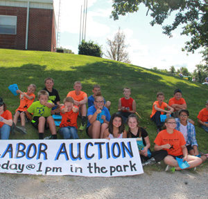 The class of 2022 held a labor auction to earn money for future high school needs. The seventh grade students were, front: Nathan Meyer, Dylan Vore, Trevor Henggeler, Madelynn Mattson, Kirsten Morrow, Jozlynn Hopper, Anne Briney, and Rachelle Villegas, back: Justin Miller, Zachary Pride, Dylan Wilmes, Auston Pride, Levi German, Colton Swalley, Lane Dack, Carson Runde, and Ben Boswell.