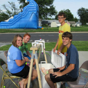  Madison Haile, daughter of Brian and Amanda Haile, Maryville; youth leader Dakota Luke, Maryville; Lincoln and Elijah Katsion, sons of John and Peggy Katsion, Maryville, filled more than 1,500 water balloons in preparation for the event.