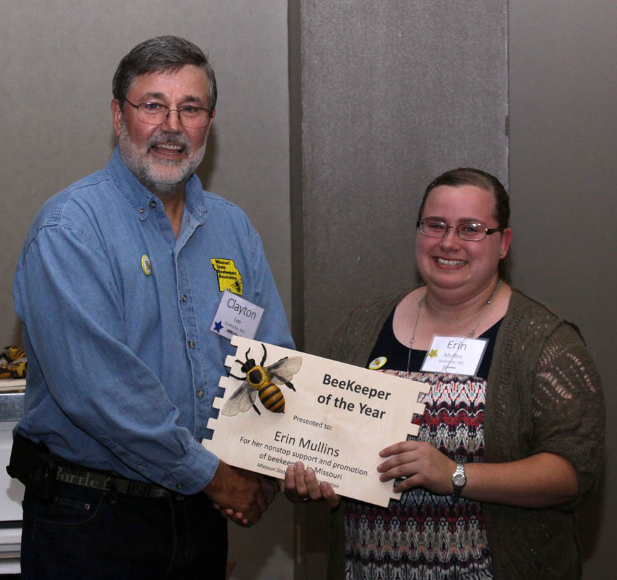 Clayton Lee, president of the Missouri State Beekeepers Association, presented Erin Mullins the distinction of Beekeeper of the Yea during the fall conference of the MSBA at the Lake of the Ozarks.