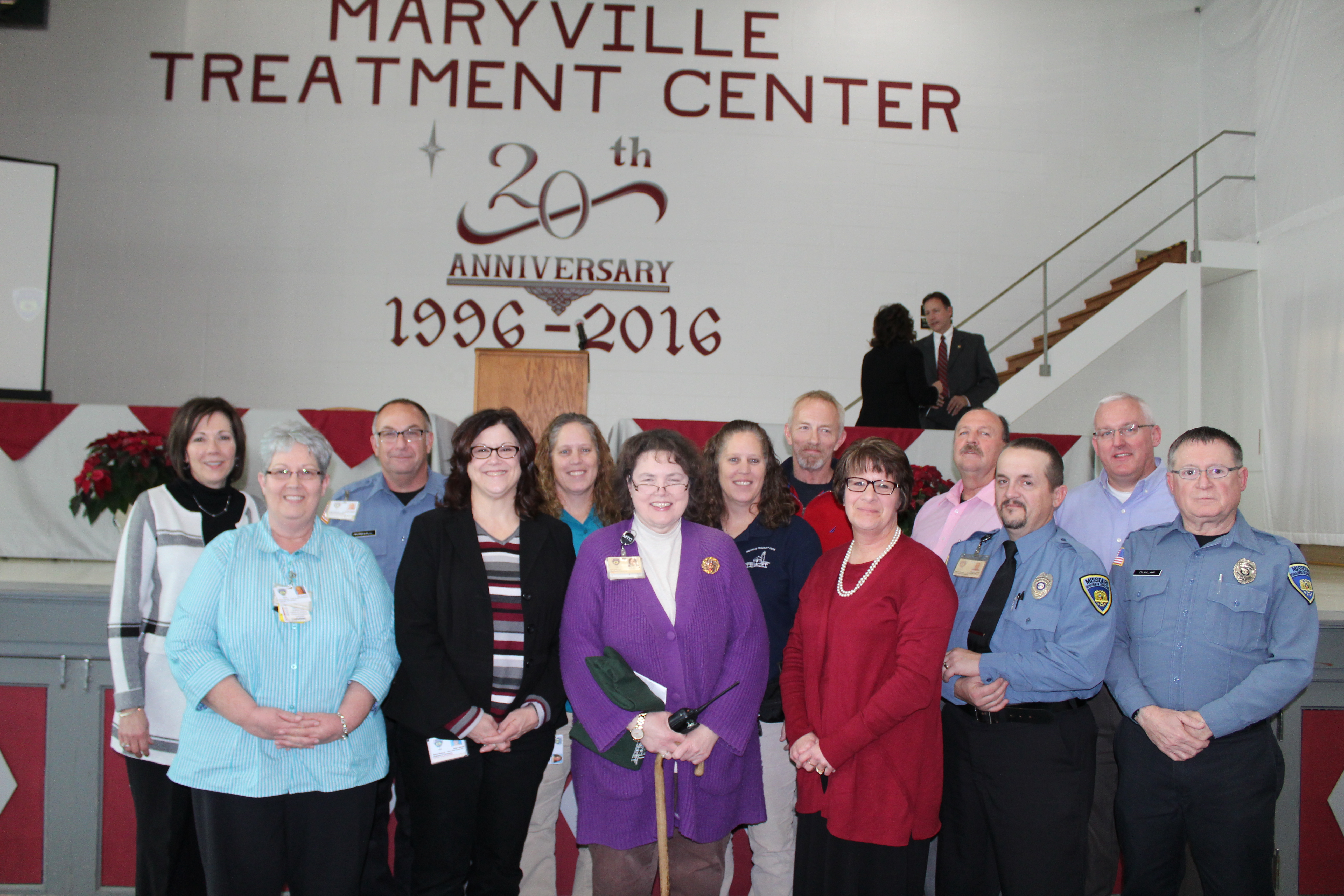 During the Maryville Treatment Center’s 20th-year celebration December 8, administrators recognized the following staff members for their 20 years of service to the facility. They are front: Judy Wonderly, Kelly Parshall, Brenda Jennings, Rhonda Steward, Jessie Privett and John Dunlap; back: Debra White, Scott Parshall, Kristy Schmitz, Amy Chor, Ralph Wallace, Tom Seipel and Kevin Shirrell. Not pictured: Sheila Sowards.